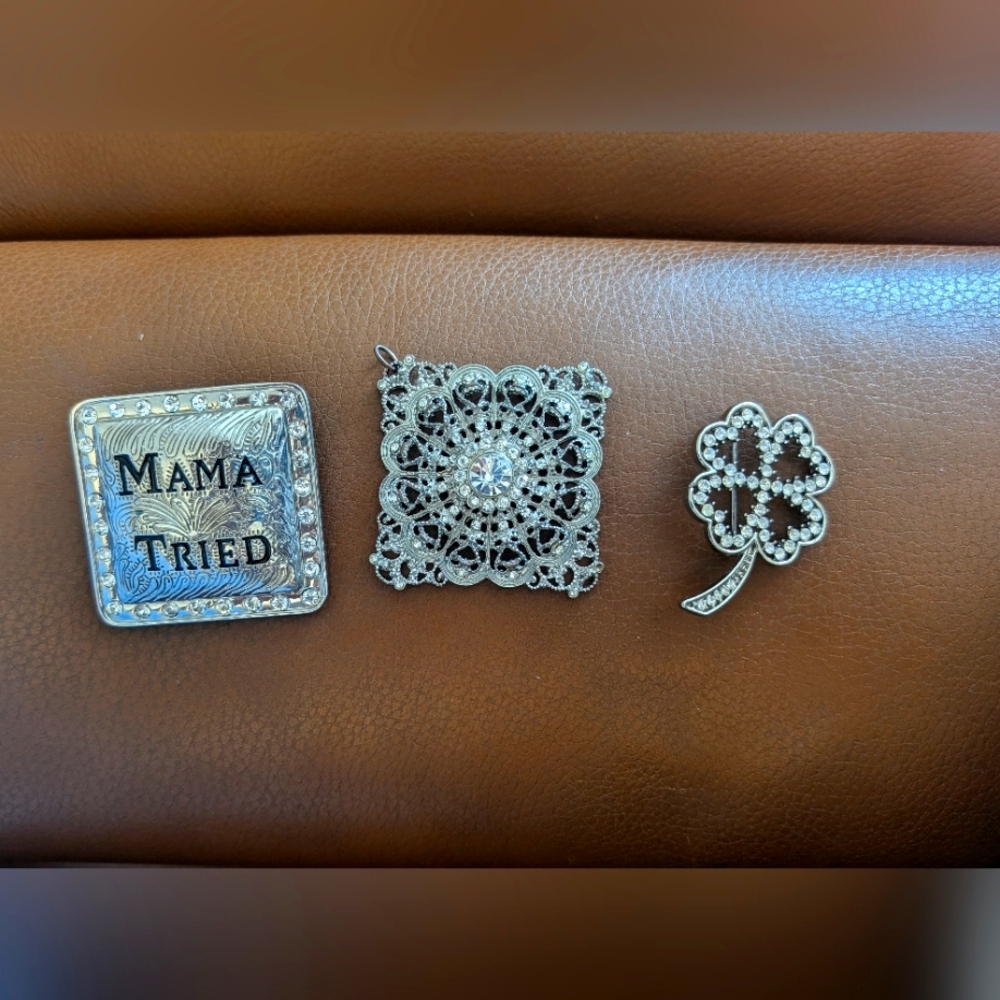 Three silver tone accessories